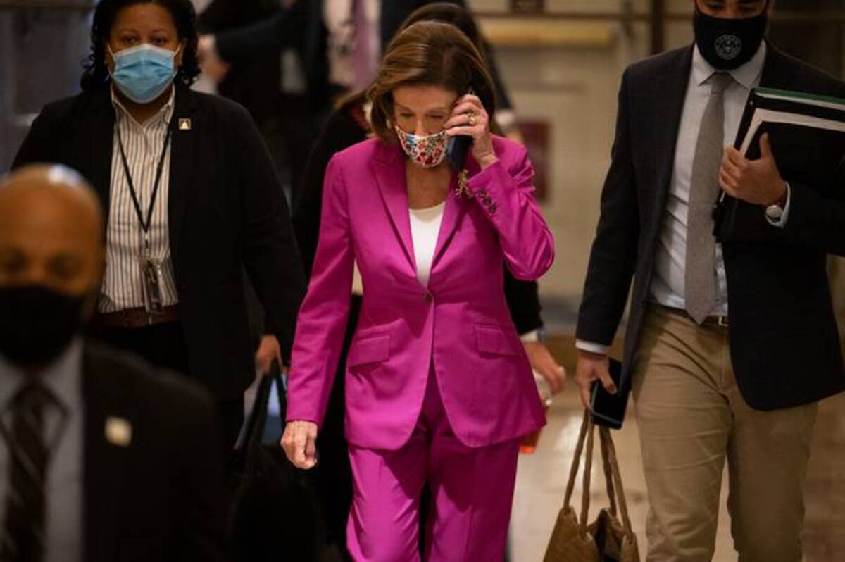 House Speaker Nancy Pelosi (D-Calif.) arrives to the U.S. Capitol in Washington, D.C., on Friday. (Craig Hudson/Bloomberg News)