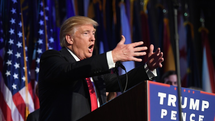 Donald Trump addresses supporters early this morning at the New York Hilton Midtown. (Photo by Jabin Botsford /The Washington Post)</p>  