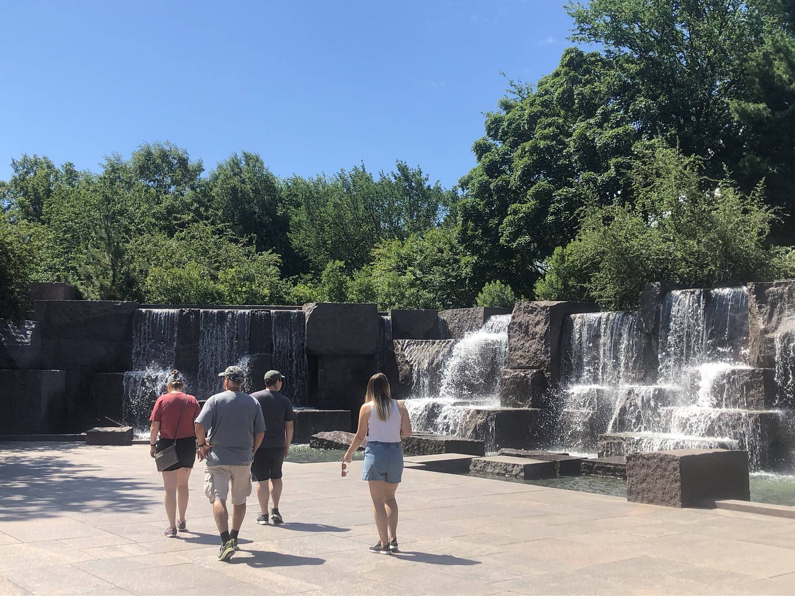 Blue skies over the FDR Memorial. (Jeannie In D.C./Flickr)