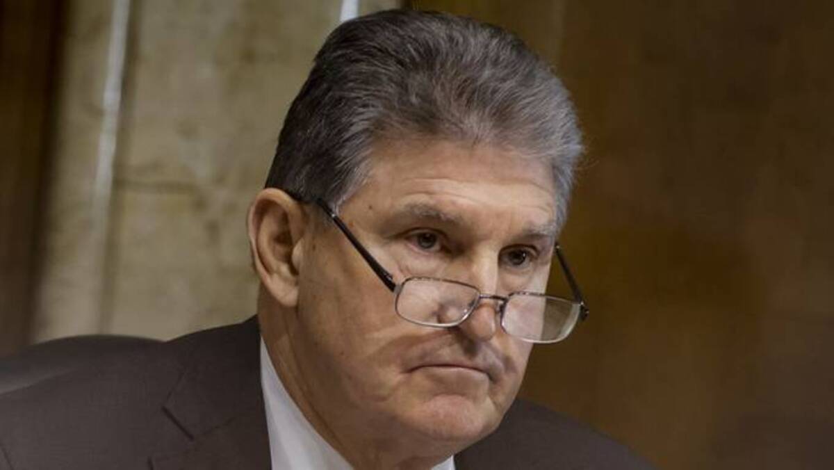Sen. Joe Manchin III (D-W.Va.) during a recent hearing. (Samuel Corum/Bloomberg News)