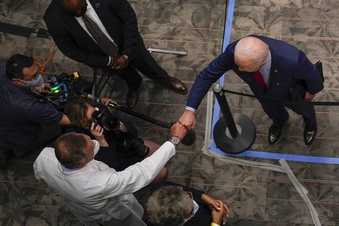 President Biden fist-bumps a doctor at the James Cancer Hospital and Solove Research Institute at Ohio State University. (Evan Vucci/AP)