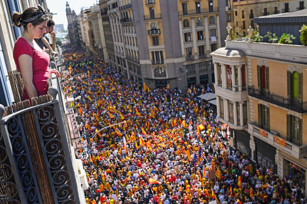 A pro-unity rally marches through Barcelona on Oct. 8 in response to last Sundays disputed referendum on Catalan independence. (Jeff J Mitchell/Getty Images)</p>
