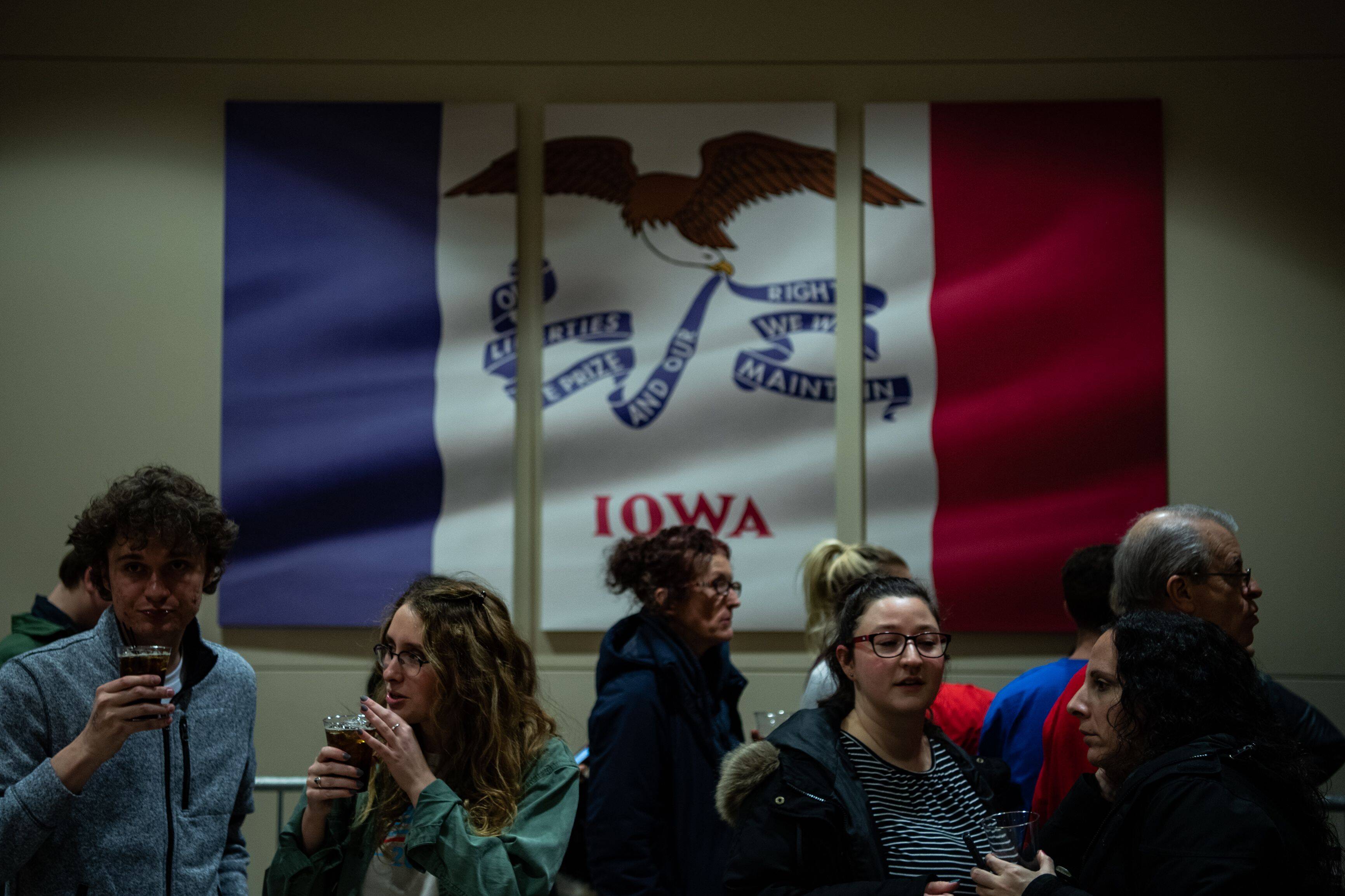 Supporters of Sen. Bernie Sanders (I-Vt.) watch wait for the Iowa caucuses results on Feb. 3, 2020, in Des Moines. (Photo by Salwan Georges/The Washington Post)
