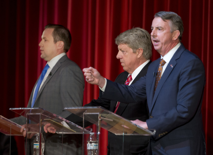 Ed Gillespie gestures during a debate in April with Corey Stewart, left, and Frank Wagner, center, at in Goochland, Va. (Steve Helber/AP)</p>  