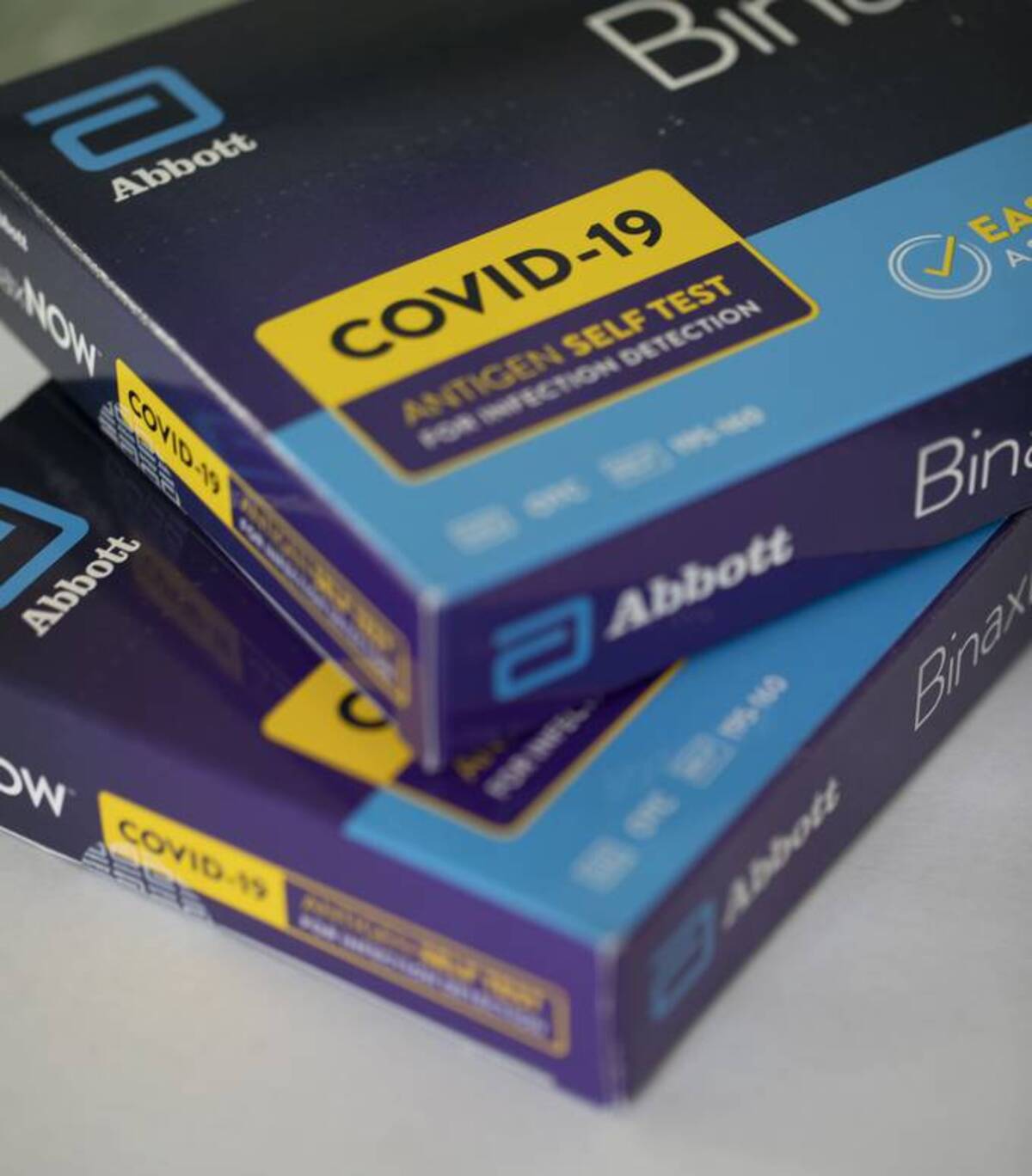 Abbott BinaxNOW Covid-19 antigen self test kits are seen on a counter. (CJ Gunther/EPA-EFE/Shutterstock)