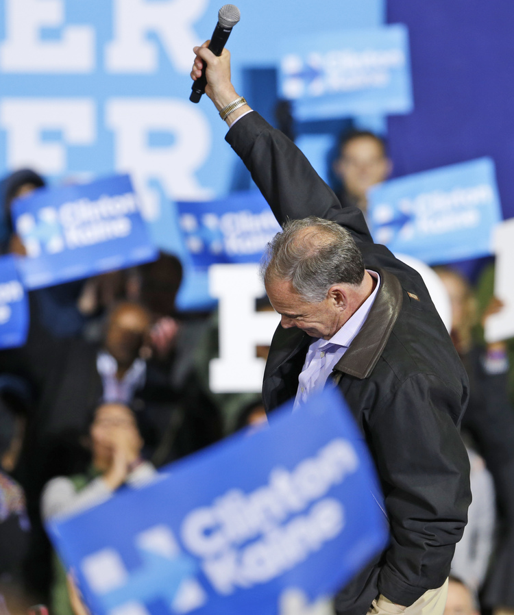 Tim Kaine gives a final salute after speaking yesterday in Richmond, where he lives and was mayor. (Steve Helber/AP)</p>  