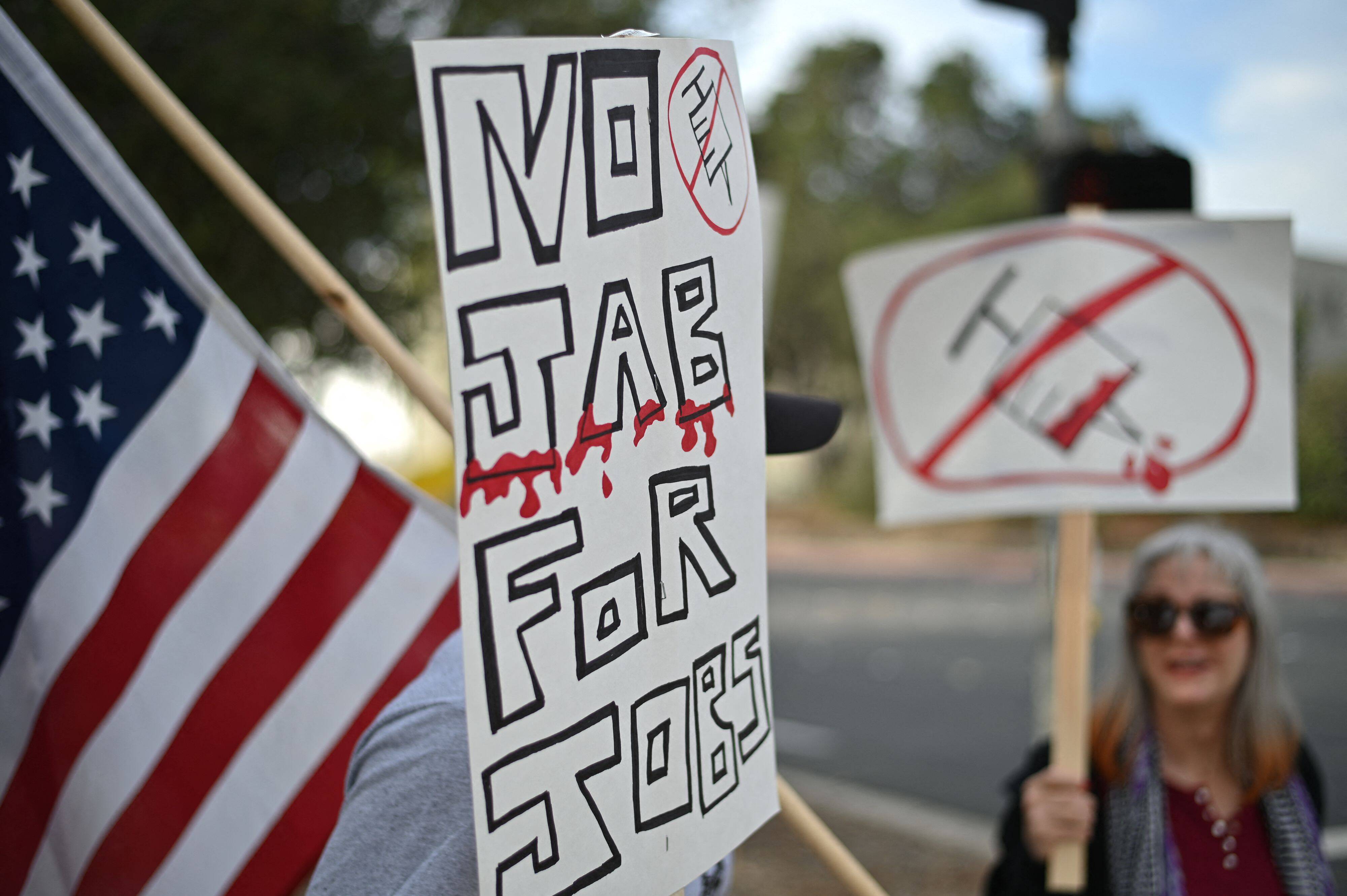 Workers at NASA's Jet Propulsion Laboratory protest vaccine mandates this week.