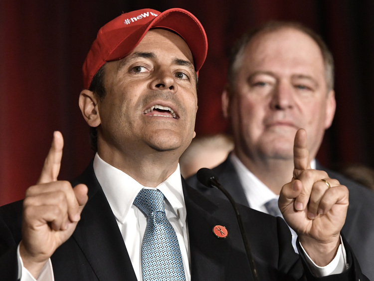 Kentucky Gov. Matt Bevin, wearing a hat with the logo #newmajority, speaks in Louisville last night. (Timothy D. Easley/AP)</p>  