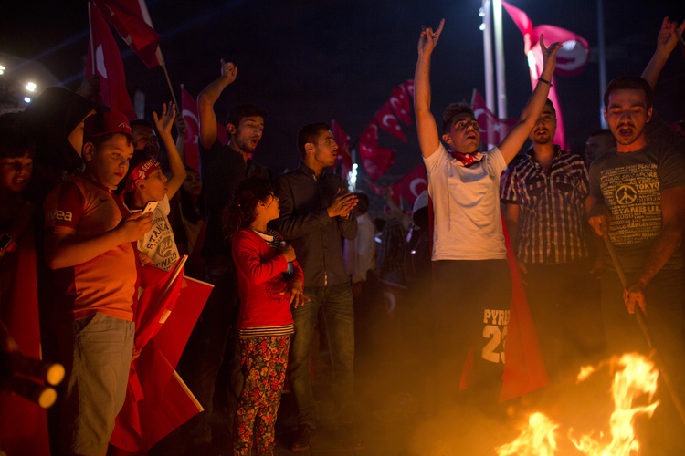 Supporters of Recep Erdogan&nbsp;burn in&nbsp;effigy the Pennsylvania-based Islamic cleric Fethullah Gulen during a pro-government demonstration at Taksim Square in Istanbul last night.&nbsp;Moody's said it's put Turkish debt on review for a possible downgrade from its Baa3 credit rating, already the lowest investment grade, because of the attempted coup and the subsequent purge's&nbsp;impact on growth. (Danielle Villasana/Bloomberg)</p>  