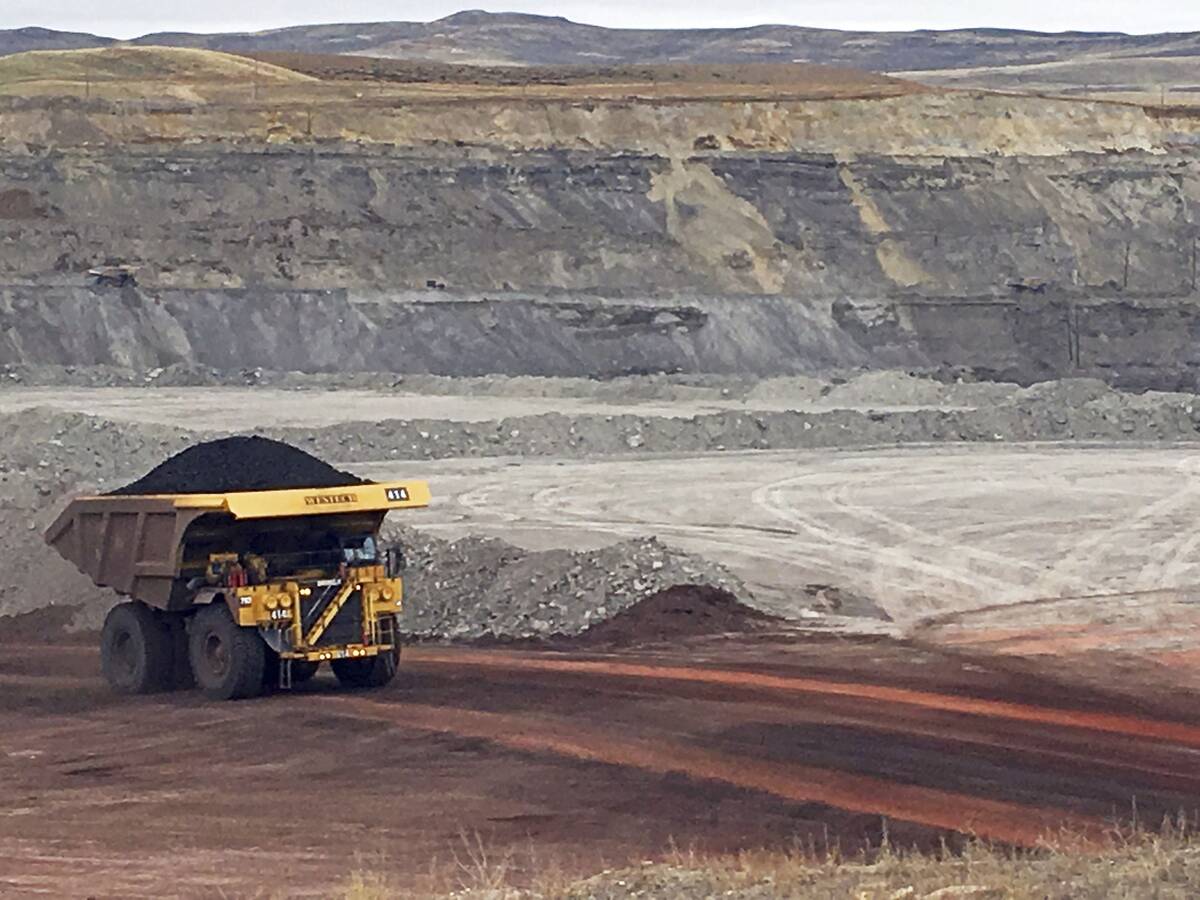 A truck hauls coal at Contura Energy's Eagle Butte Mine near Gillette, Wyo. Lawyers for the federal government this month declined to defend the Obama administration's 2016 coal moratorium and, instead, argued that a lawsuit to restore it should be dismissed. (Mead Gruver/AP Photo)