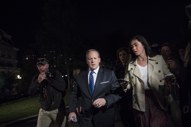 White House press secretary Sean Spicer speaks to reporters outside the West Wing last night. (Jabin Botsford/The Washington Post)</p>  