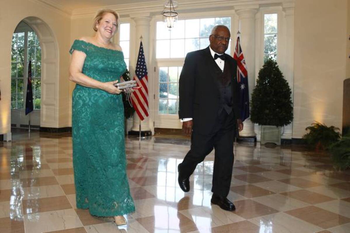 Ginni Thomas, left, signed a letter in December criticizing the House committee investigating the Jan. 6, 2021, attack on the Capitol — just one month before her husband, Supreme Court Justice Clarence Thomas, right, ruled on a key matter involving the committee's probe. (Patrick Semansky/AP)