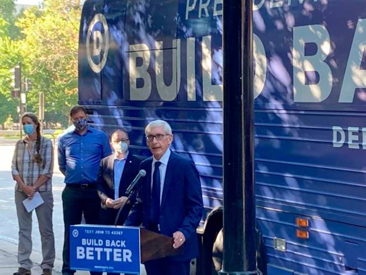 Gov. Tony Evers (D) speaks outside the state Capitol in Madison, Wis. (Scott Bauer/AP)