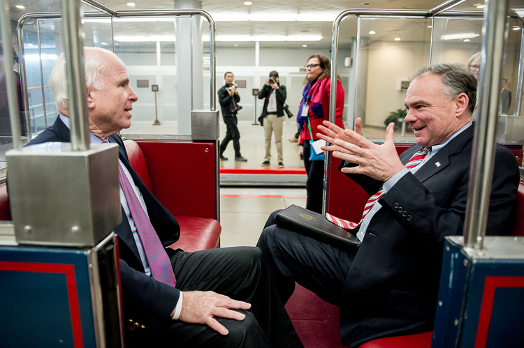 Tim Kaine&nbsp;rides the Senate subway&nbsp;with John McCain.&nbsp;(Andrew Harnik for The Washington Post)</p>  