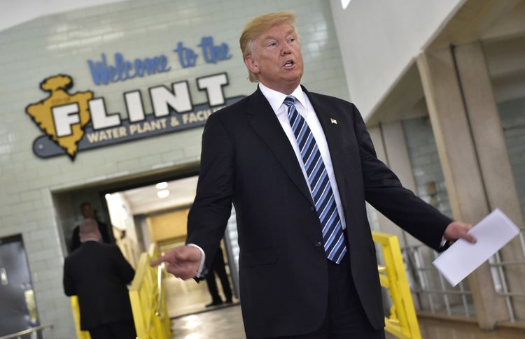 Trump speaks after a tour of the Flint water plant. (Mandel Ngan/Getty Images)</p>  