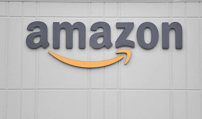 Many of the companies had little choice but to accept, said former Amazon employees. (Angela Weiss/AFP/Getty Images)