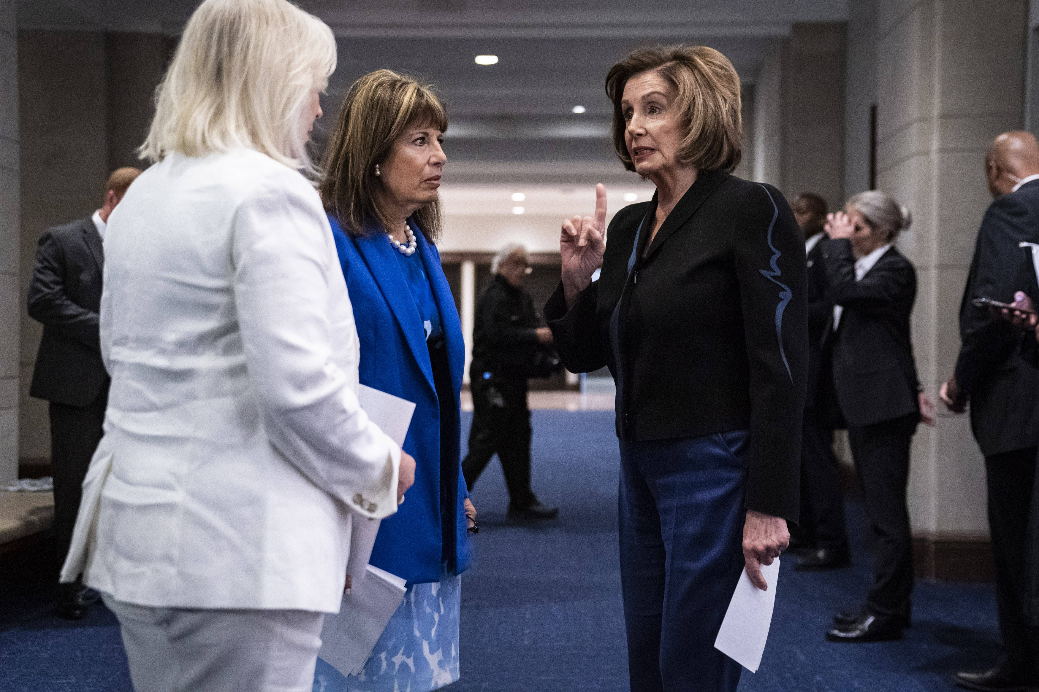 House Speaker Nancy Pelosi (D-Calif.) with Democratic colleagues at the Capitol on Wednesday.