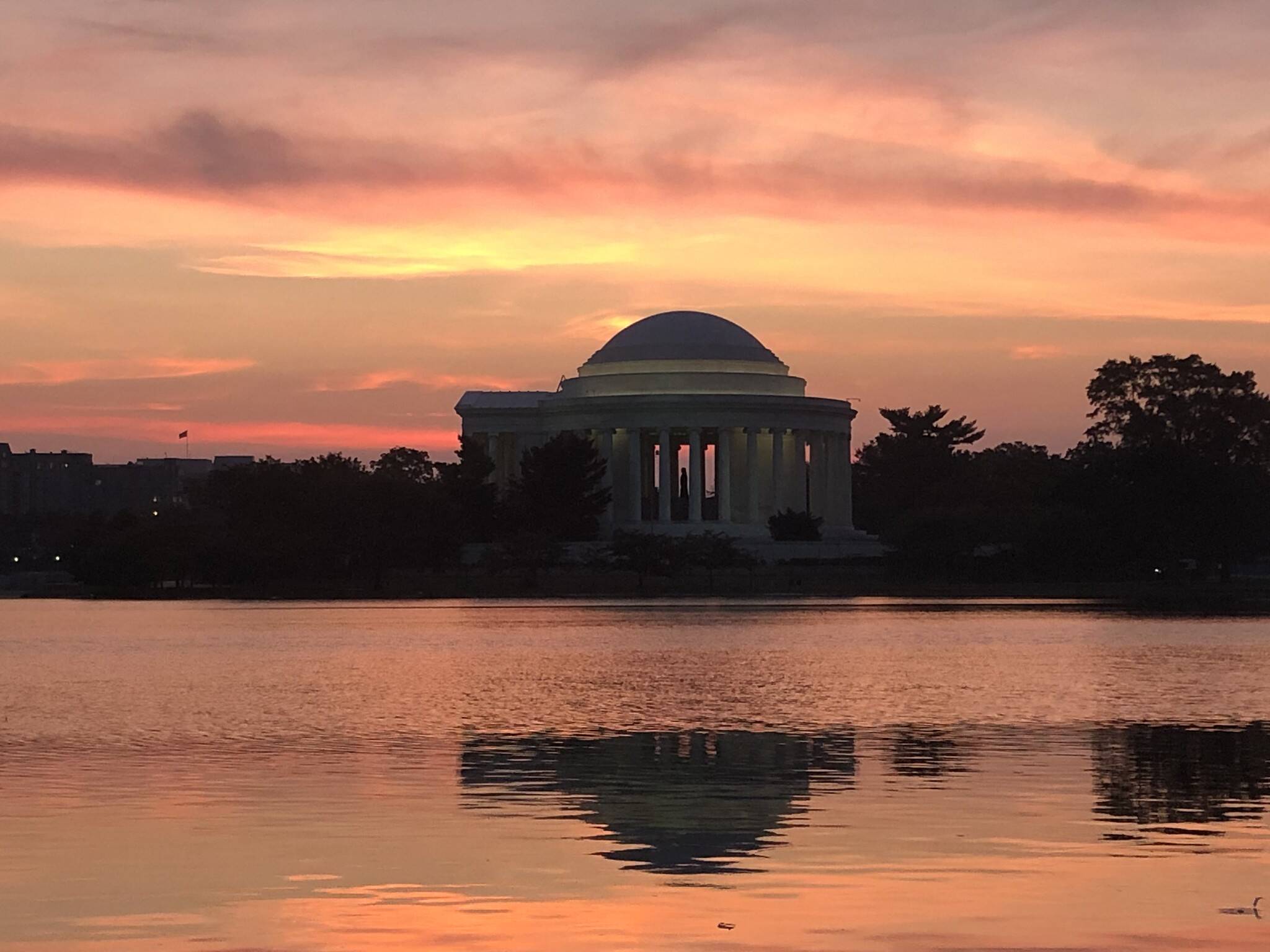 Colorful clouds Wednesday over the Tidal Basin at dawn.