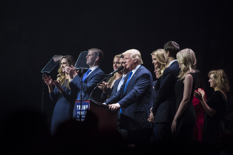 Trump, surrounded by his family and Mike Pence, speaks in New Hampshire. (Jabin Botsford/The Washington Post)</p>  