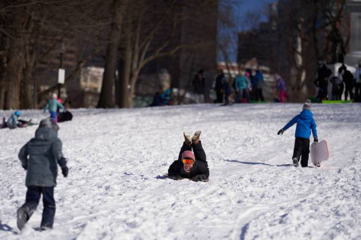 Boston residents have a snow day on Jan. 30. (Allison Dinner/Bloomberg News)