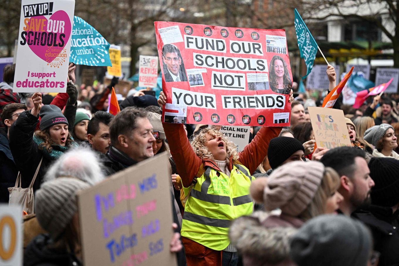 Teachers protest in St. Peter's Square in Manchester, England, on Wednesday. (Oli Scarff/AFP/Getty Images)