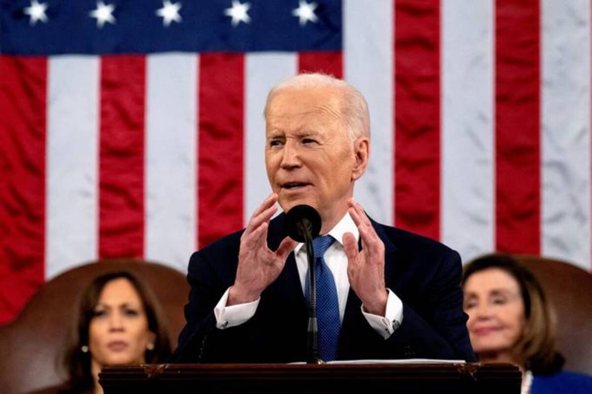 President Biden delivers the State of the Union address to a joint session of Congress at the U.S. Capitol on Tuesday. (Saul Loeb/Reuters)