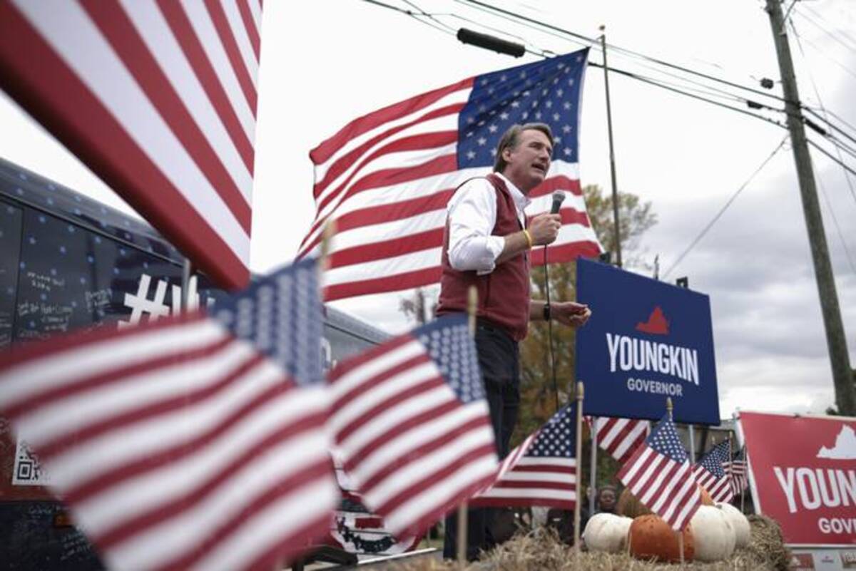 Glenn Youngkin delivers remarks at a campaign event in the parking lot of Vito's Pizza Bar &amp; Grill on Thursday in Amherst, Va. (Anna Moneymaker/Getty Images)