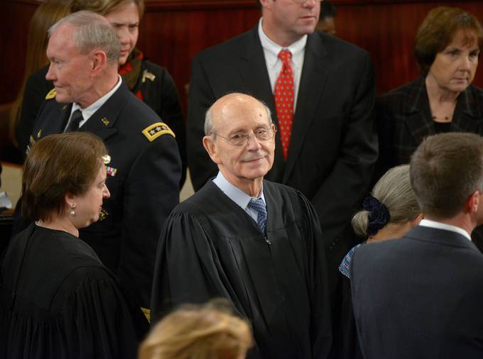 Supreme Court Justice Stephen G. Breyer, center, waits for President Obama's arrival for the State of the Union address in 2014. (Bill O'Leary/The Washington Post)