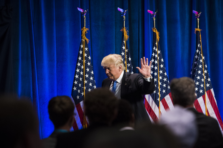 Trump walks out after speaking in Manchester, New Hampshire, yesterday.&nbsp;(Photo by Jabin Botsford/The Washington Post)</p>  