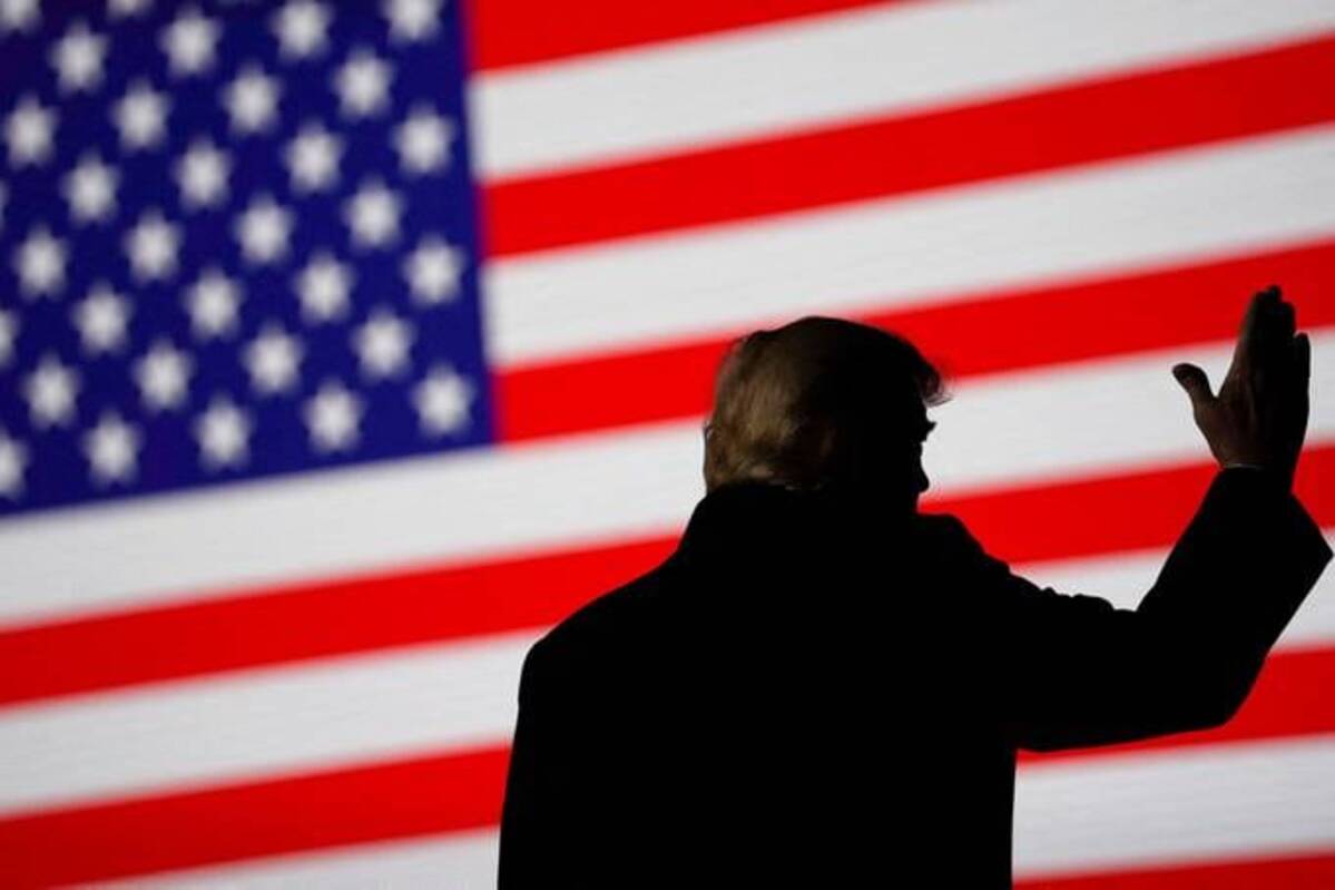Former President Donald Trump gestures during a rally in Conroe, Tex., on Jan. 29. (Go Nakamura/Reuters)