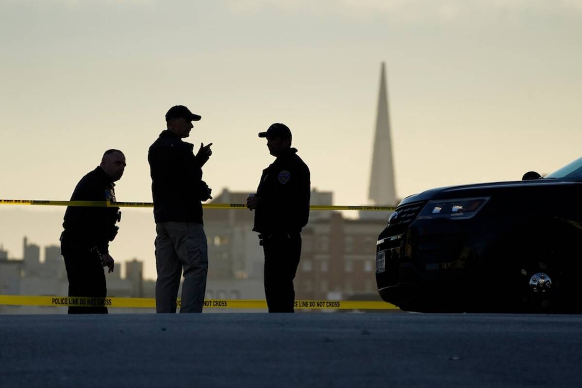 Police stand at the top of the closed street outside the home of House Speaker Nancy Pelosi (D-Calif.) and her husband, Paul Pelosi, in San Francisco on Friday. (Eric Risberg/AP)&nbsp;