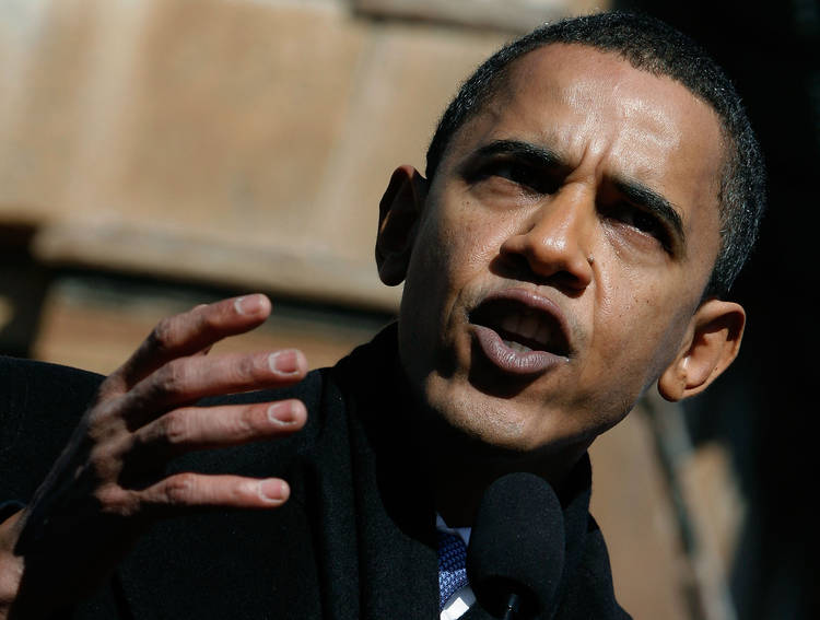 Barack Obama, before he had gray hair, launches his presidential campaign in February 2007 at the Old State Capitol building in Springfield, Ill. (Mark Wilson/Getty Images)  