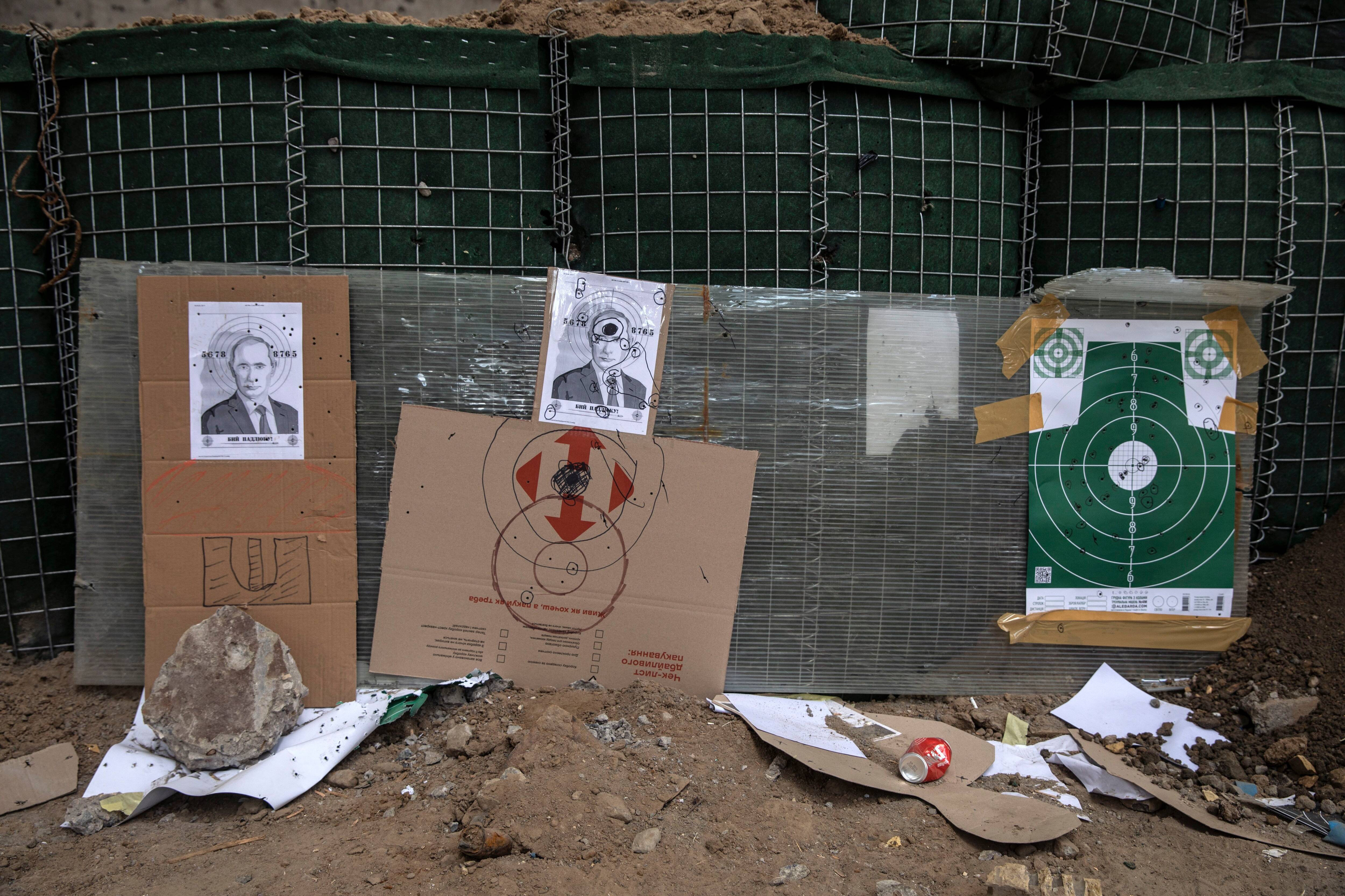 Ukrainian members of the Azov Battalion as they practice shooting live bullets at a training site in Kyiv on March 24. (Heidi Levine for The Washington Post)