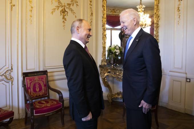 President Biden and Russian President Vladimir Putin share a lighter moment while meeting this week in Geneva. (Peter Klaunzer/Swiss Federal Office of Foreign Affairs/AP)
