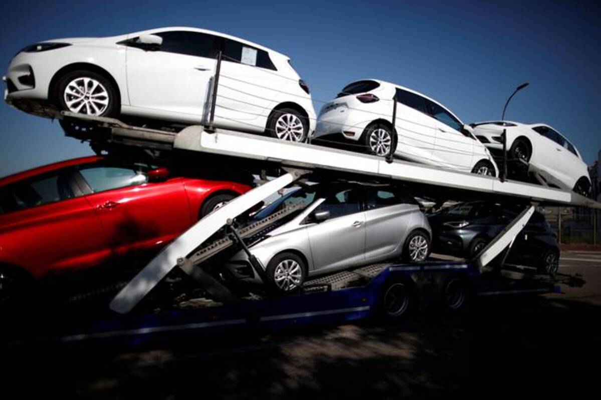 A car carrier leaves a Renault plant in Aubergenville, France, in 2020. (Benoit Tessier/Reuters)