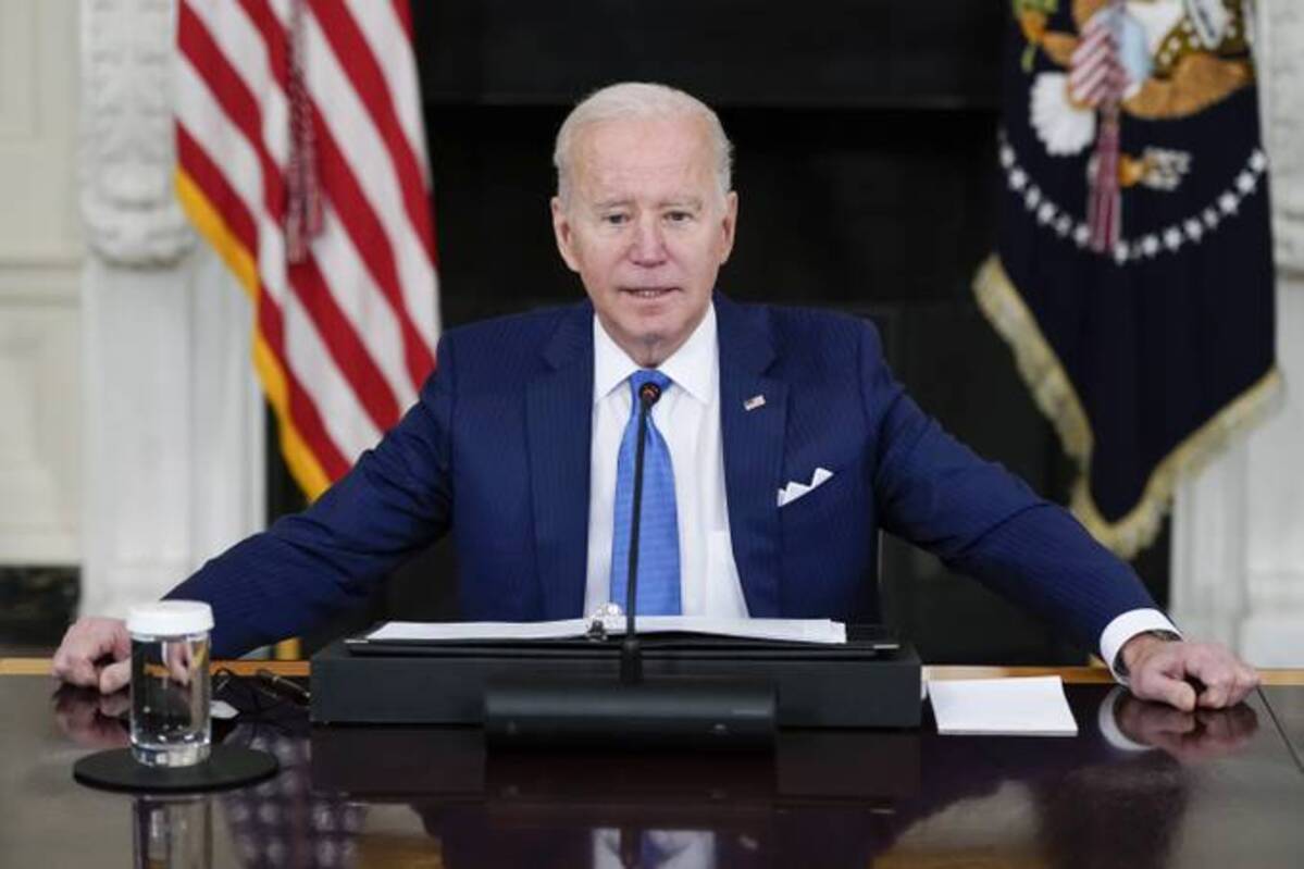 President Biden speaks during a roundtable meeting with CEOs of electric utilities in the State Dining Room of the White House on Wednesday. (Patrick Semansky/AP)