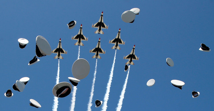 The Thunderbirds perform a fly-over at yesterday's Air Force Academy graduation. (Reuters/Kevin Lamarque)</p>  
