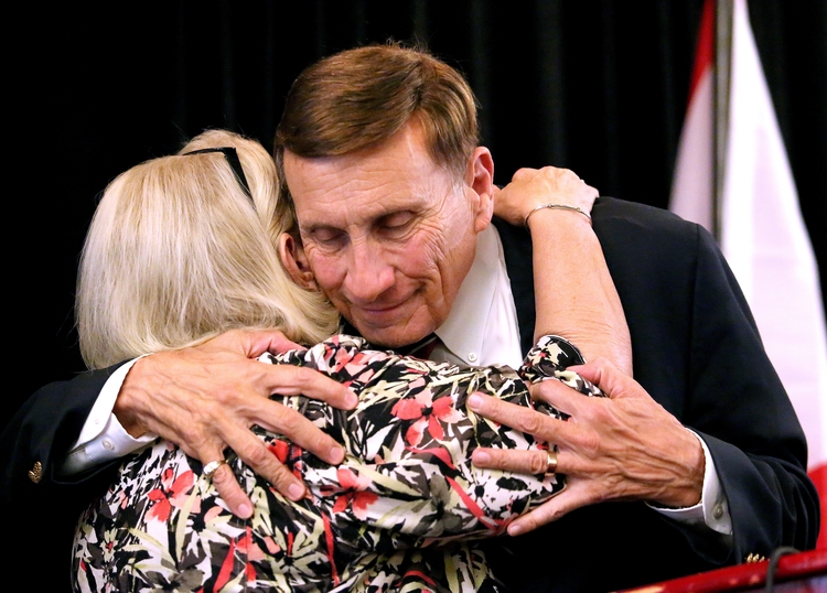 Rep. John Mica (R-Florida) gets a hug from his wife, Patrica, after conceding defeat to Democratic challenger Stephanie Murphy in Altamonte Springs last night. (Joe Burbank/Orlando Sentinel via AP)</p>  