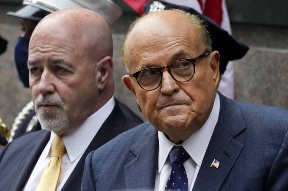 Former New York Mayor Rudolph Giuliani and former New York City police Commissioner Bernard Kerik during the Tunnel to Towers ceremony in New York. (Mark Lennihan/AP)