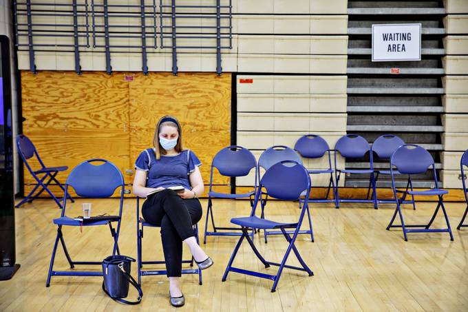 Shannon Thackeray waits after receiving a coronavirus vaccine dose at a site in Provo, Utah, on June 2. (Kim Raff for The Washington Post)