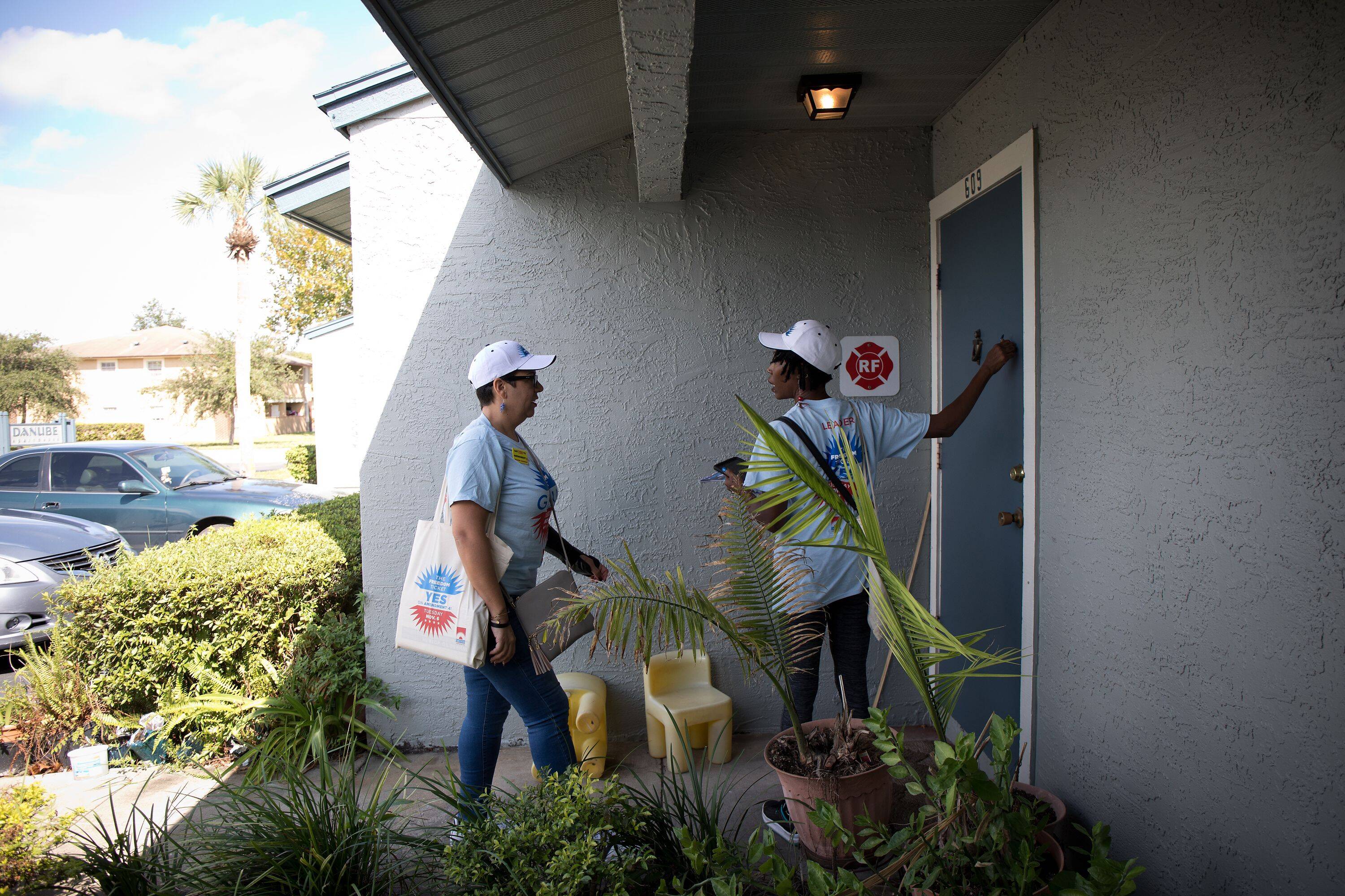 Debbie Soto, 45, and Tamecka Pierce, 44, canvas through Win Justice Coalition in Orlando, Fla., on Oct. 27, 2018. &nbsp;(Photo by Charlotte Kesl for The Washington Post)