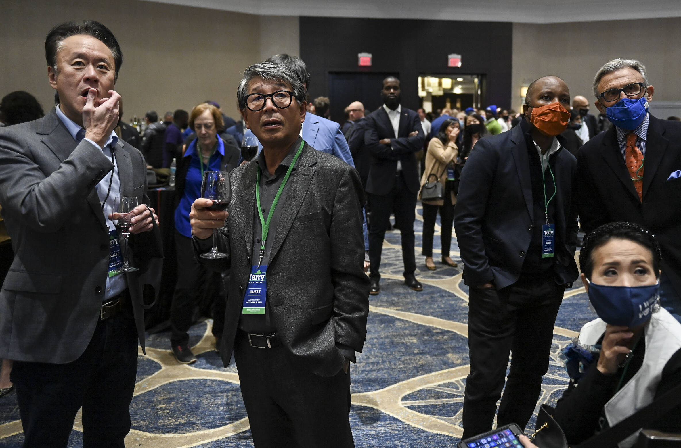 Virginia Democrats watch returns come in on Tuesday. (Jonathan Newton/The Washington Post)