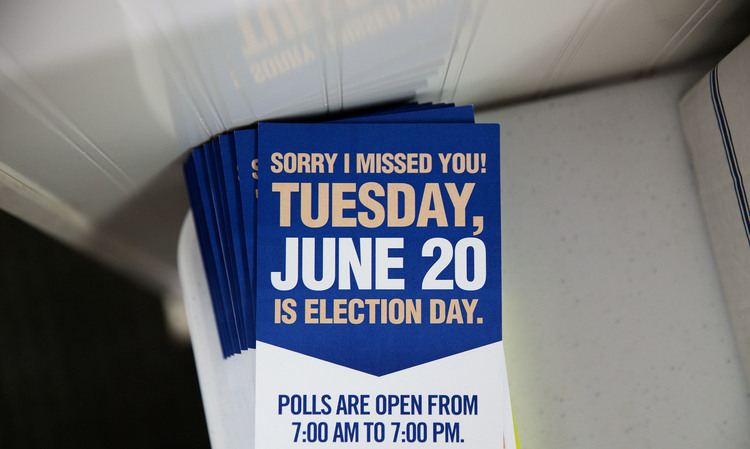 Pamphlets sit outside the Ossoff campaign office in Chamblee, Ga. (David Goldman/AP)</p>  