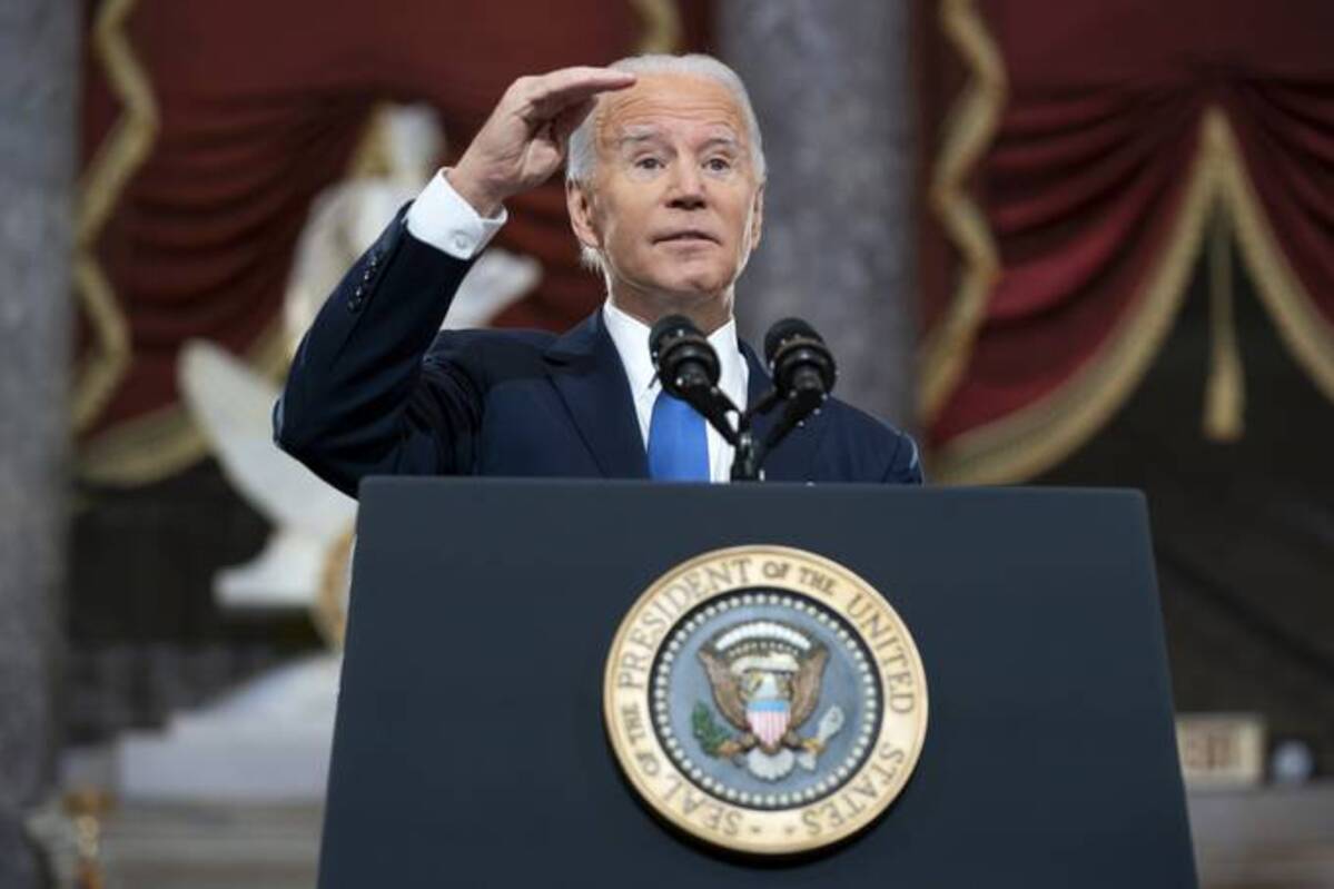 President Biden speaks from Statuary Hall at the U.S. Capitol to mark the one year anniversary of the Jan. 6 riot at the U.S. Capitol by supporters loyal to then-President Donald Trump. (Greg Nash/Pool via AP)