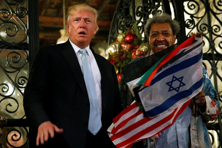 Trump and boxing promoter Don King speak to reporters outside the Mar-a-lago Club in Palm Beach on Dec. 28. (Jonathan Ernst/Reuters)</p>  