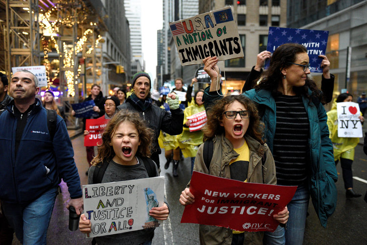 People march towards Trump Tower during an anti-Trump protest in Manhattan.&nbsp;(Reuters/Darren Ornitz)</p>  