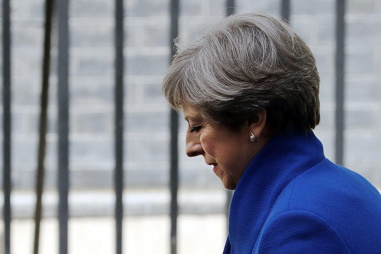 Theresa May arrives back at Downing Street after going to Buckingham Palace on June 9. (Dan Kitwood/Getty Images)</p>  