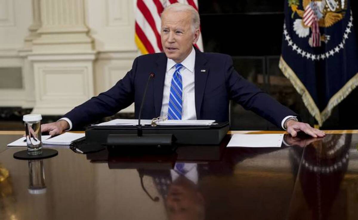 President Biden speaks during a meeting with private sector chief executive officers to discuss his Build Back Better agenda in the State Dining Room of the White House on Wednesday. (Leigh Vogel/UPI/Bloomberg News)