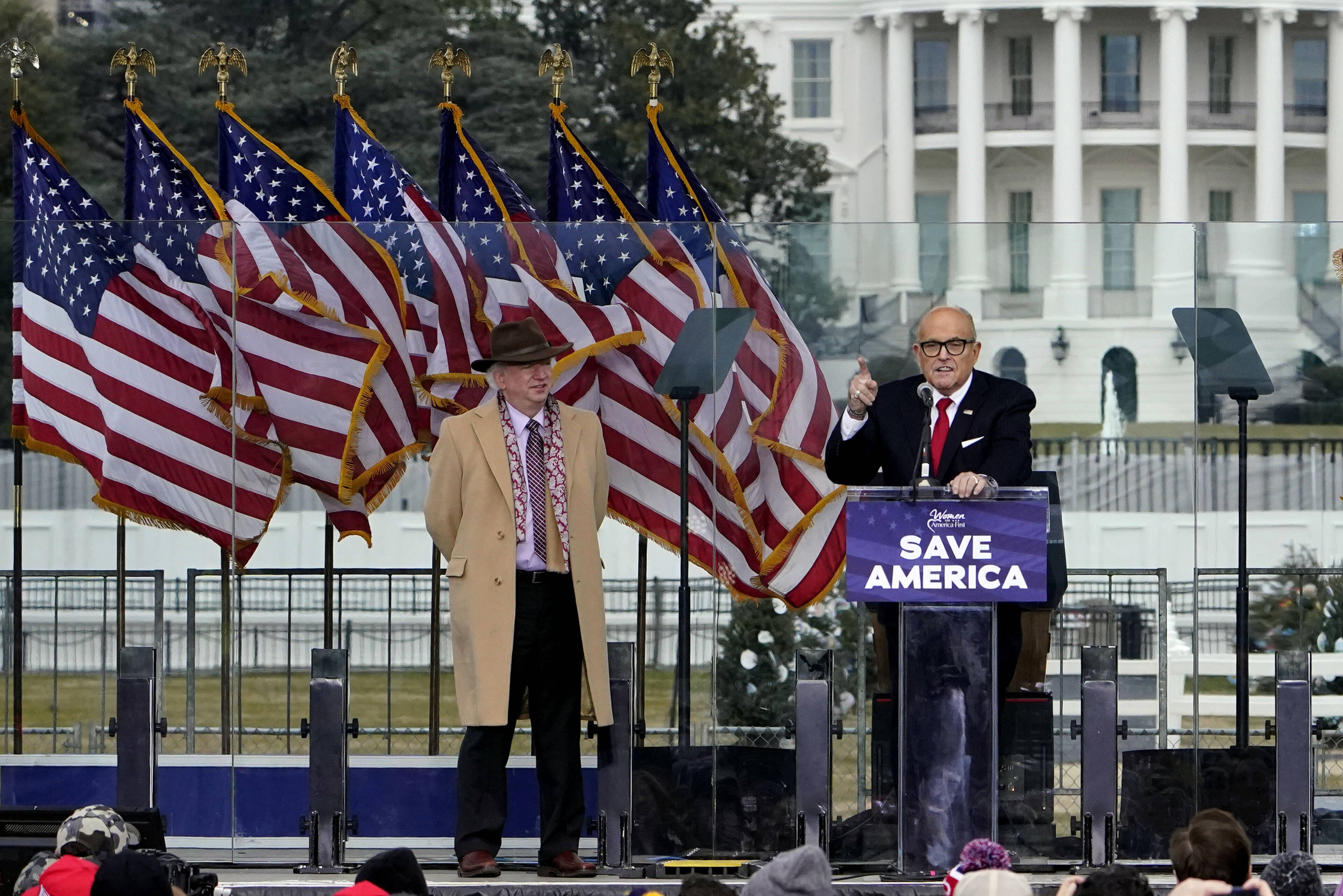 John Eastman at left as Rudy Giuliani speaks at the "Stop the Steal" rally on Jan. 6, 2021. (Jacquelyn Martin/AP)