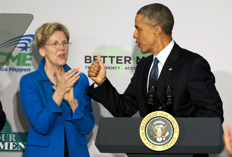 Elizabeth Warren applauds as Barack Obama speaks at the AARP headquarters in 2015. The president once huffed that Warren was "a politician like everybody else," an expression of his frustration&nbsp;with liberals who he feels don't have understand how hard it is to lead. (Jacquelyn Martin/AP)</p>  